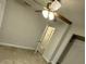 Bedroom featuring a ceiling fan and an entryway at 9618 N 13Th St, Tampa, FL 33612