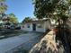 Cozy single-story house with a fenced yard providing privacy and security at 9618 N 13Th St, Tampa, FL 33612