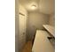 Functional laundry area with washer, dryer, and storage at 9618 N 13Th St, Tampa, FL 33612