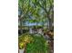 Charming community space with comfortable seating, lush landscaping, and serene ambiance at 985 Wellington Ct, Dunedin, FL 34698