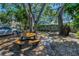 Outdoor picnic area offers a shaded space to relax and enjoy the beautiful outdoors at 985 Wellington Ct, Dunedin, FL 34698