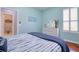 Bright bedroom featuring a calming color palette, coordinating decor, and ample natural light at 1023 Orca Ct, Holiday, FL 34691