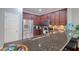 Modern kitchen featuring stainless steel appliances, updated cabinets, and a peninsula island at 1023 Orca Ct, Holiday, FL 34691