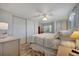 Comfortable bedroom with ample closet space, ceiling fan, and natural light at 104 Saint Kitts Way, Apollo Beach, FL 33572