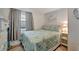 Comfortable bedroom features calming decor and ample natural light at 104 Saint Kitts Way, Apollo Beach, FL 33572