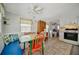 Bright dining area features colorful decor and seamless kitchen access at 104 Saint Kitts Way, Apollo Beach, FL 33572
