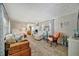 Spacious living room with stylish decor, modern amenities, and cozy seating arrangements at 104 Saint Kitts Way, Apollo Beach, FL 33572