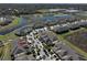 This aerial view highlights community amenities, and pond views at 10947 Verawood Dr, Riverview, FL 33579