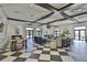 Elegant clubhouse interior featuring stylish furnishings, high ceilings, and sophisticated decor at 10947 Verawood Dr, Riverview, FL 33579
