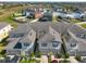 This is an aerial view of a multi-Gathering unit with multiple garages at 10947 Verawood Dr, Riverview, FL 33579