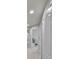 Long hallway that features a closet and access to the bedrooms at 10947 Verawood Dr, Riverview, FL 33579