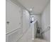 Hallway with closet and access to the second floor and bedrooms at 10947 Verawood Dr, Riverview, FL 33579