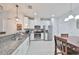 Modern kitchen featuring stainless steel appliances and granite countertops at 10947 Verawood Dr, Riverview, FL 33579