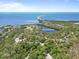 Beautiful coastal community with serene Fred Howard Park, featuring walking paths, lakes, and natural beauty at 110 Parkside Colony Dr, Tarpon Springs, FL 34689