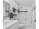 Well-lit bathroom featuring a shower-tub combo and updated vanity at 110 Parkside Colony Dr, Tarpon Springs, FL 34689