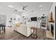 Cozy living room with fireplace, built-in shelving, and contemporary decor at 110 Parkside Colony Dr, Tarpon Springs, FL 34689