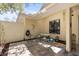 Cozy outdoor patio area with comfortable seating and ample natural light at 110 Parkside Colony Dr, Tarpon Springs, FL 34689