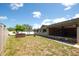 Spacious backyard featuring a patio with a hot tub and fire pit at 11797 David Ct, Largo, FL 33778