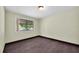 Cozy bedroom featuring hardwood floors and natural light at 11797 David Ct, Largo, FL 33778