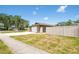 Charming single-story home with a stone facade and a two-car garage at 11797 David Ct, Largo, FL 33778