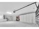 Spacious garage featuring built-in storage, ample lighting, utility sink and water heater at 11797 David Ct, Largo, FL 33778