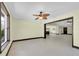Living area with tile flooring and large picture window at 11797 David Ct, Largo, FL 33778