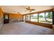 The enclosed lanai features many windows and lots of light at 11797 David Ct, Largo, FL 33778
