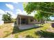 Covered patio perfect for relaxing and entertaining, featuring a spacious seating area at 11797 David Ct, Largo, FL 33778