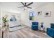 Stylishly staged bedroom featuring a comfortable bed, elegant decor, and ample natural light at 120 12Th N Ave, Safety Harbor, FL 34695