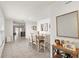 Open dining area featuring tile floors and natural light at 12168 Lily Magnolia Ln, Riverview, FL 33569