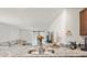 Bright kitchen with granite countertops and stainless steel appliances at 12168 Lily Magnolia Ln, Riverview, FL 33569