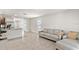 Comfortable living room featuring tile flooring and a neutral color palette at 12168 Lily Magnolia Ln, Riverview, FL 33569