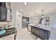 Well-equipped kitchen with stainless steel appliances, a functional island, and abundant storage at 12206 Blue Pacific Dr, Riverview, FL 33579