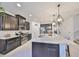 Elegant kitchen featuring granite countertops, stainless steel appliances, and ample cabinet space at 12206 Blue Pacific Dr, Riverview, FL 33579