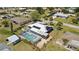 Aerial view of property showcasing screened pool, roof, and surrounding neighborhood at 170 Argus Rd, Venice, FL 34293