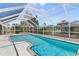 Relaxing pool with ample room for leisure activities at 170 Argus Rd, Venice, FL 34293