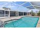 Inviting pool in a screened enclosure, offering a refreshing escape at 170 Argus Rd, Venice, FL 34293