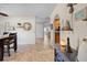Hallway with tiled flooring and a decorative mirror on the wall at 18836 Green Park Rd, Hudson, FL 34667