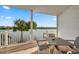 Enjoy waterfront views from the spacious balcony, perfect for outdoor dining and relaxation at 19817 Gulf Blvd # 602, Indian Shores, FL 33785