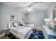 Charming bedroom featuring two twin beds, nautical decor, and a blue accent rug, creating a cozy and themed space at 19817 Gulf Blvd # 602, Indian Shores, FL 33785