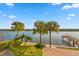 Enjoy stunning water views framed by lush landscaping and mature palm trees from this property at 19817 Gulf Blvd # 602, Indian Shores, FL 33785
