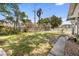 Large backyard offering ample green space and potential for outdoor activities and relaxation at 2224 Gordon St, Tampa, FL 33605