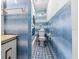 Clean, well-maintained bathroom with blue tilework and modern fixtures that provide functionality at 2224 Gordon St, Tampa, FL 33605