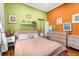 Comfortable bedroom features eclectic decor and a relaxing ambiance at 2224 Gordon St, Tampa, FL 33605