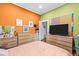 Well-lit bedroom with matching dressers, colorful walls, and a comfortable bed at 2224 Gordon St, Tampa, FL 33605