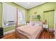 Cozy bedroom featuring eclectic decor and a relaxing ambiance at 2224 Gordon St, Tampa, FL 33605