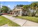 Lovely single-story home with a well-kept front yard and a welcoming facade at 2224 Gordon St, Tampa, FL 33605