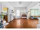 Charming living room with hardwood floors, a decorative ceiling, and an open layout at 2224 Gordon St, Tampa, FL 33605