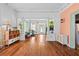 Spacious living room with hardwood floors, classic architectural details, and abundant natural light at 2224 Gordon St, Tampa, FL 33605
