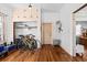 Vintage style home office, hardwood floors, bike storage, and built-in shelves provides ample space at 2224 Gordon St, Tampa, FL 33605